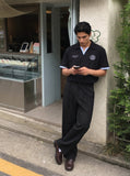 DAXUEN Short-sleeve polo shirt with striped details and embroidery — model photo