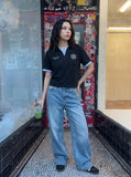 DAXUEN Short-sleeve polo shirt with striped details and embroidery — model photo