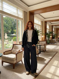 DAXUEN Wide-leg denim jeans with metal details — model photo