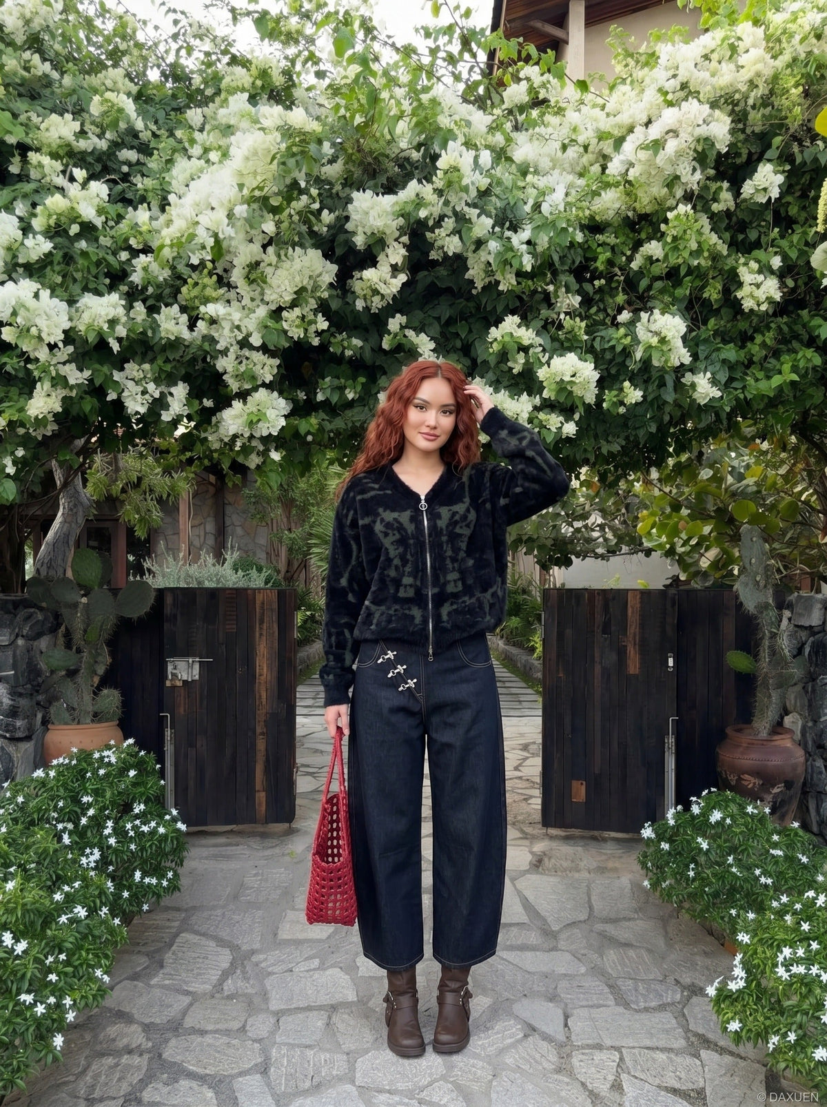 DAXUEN Wide-leg denim jeans with metal details — model photo