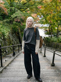 DAXUEN Wide-leg denim jeans with metal details — model photo