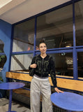 DAXUEN Loose-fitting wide-leg pants with gothic print — model photo
