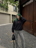 DAXUEN black embroidered BEFEARLE graphic hooded sweatshirt — model photo