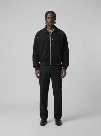 DAXUEN Embroidered bomber jacket in black and beige — model photo