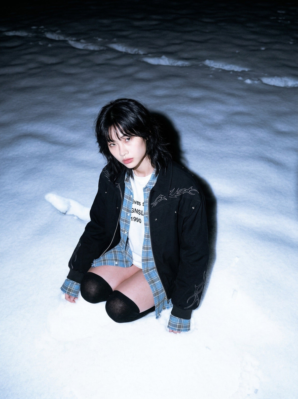 DAXUEN Embroidered bomber jacket in black and beige — model photo