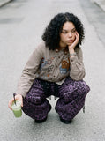 DAXUEN brown plaid shirt with embroidered cat faces — model photo