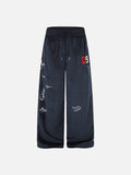 DAXUEN dark blue velvet embroidered script track pants