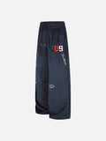 DAXUEN dark blue velvet embroidered script track pants