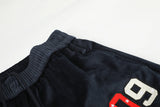 DAXUEN dark blue velvet embroidered script track pants