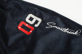 DAXUEN dark blue velvet embroidered script track pants