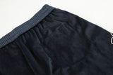 DAXUEN dark blue velvet embroidered script track pants