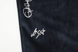 DAXUEN dark blue velvet embroidered script track pants