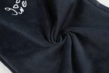 DAXUEN dark blue velvet embroidered script track pants