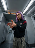 DAXUEN black embroidered shield logo track jacket — model photo