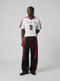 DAXUEN white short-sleeved soccer ball graphic jersey — model photo