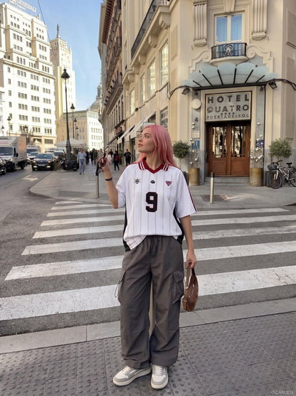 DAXUEN white short-sleeved soccer ball graphic jersey — model photo