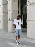 DAXUEN white short-sleeved soccer ball graphic jersey — model photo