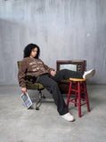DAXUEN muted brown embroidered text corduroy baseball jacket — model photo