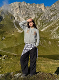 DAXUEN light grey quilted jacket with embroidered tigers — model photo