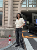 DAXUEN Short sleeve shirt with embroidery and shell charms — model photo