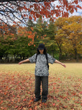 DAXUEN Graphic t-shirt with bubble-like print — model photo