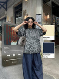 DAXUEN Graphic t-shirt with bubble-like print — model photo