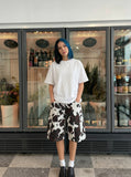 DAXUEN Short-sleeved oversized t-shirt in solid colors — model photo