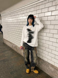 DAXUEN white oversized hands graphic tee — model photo