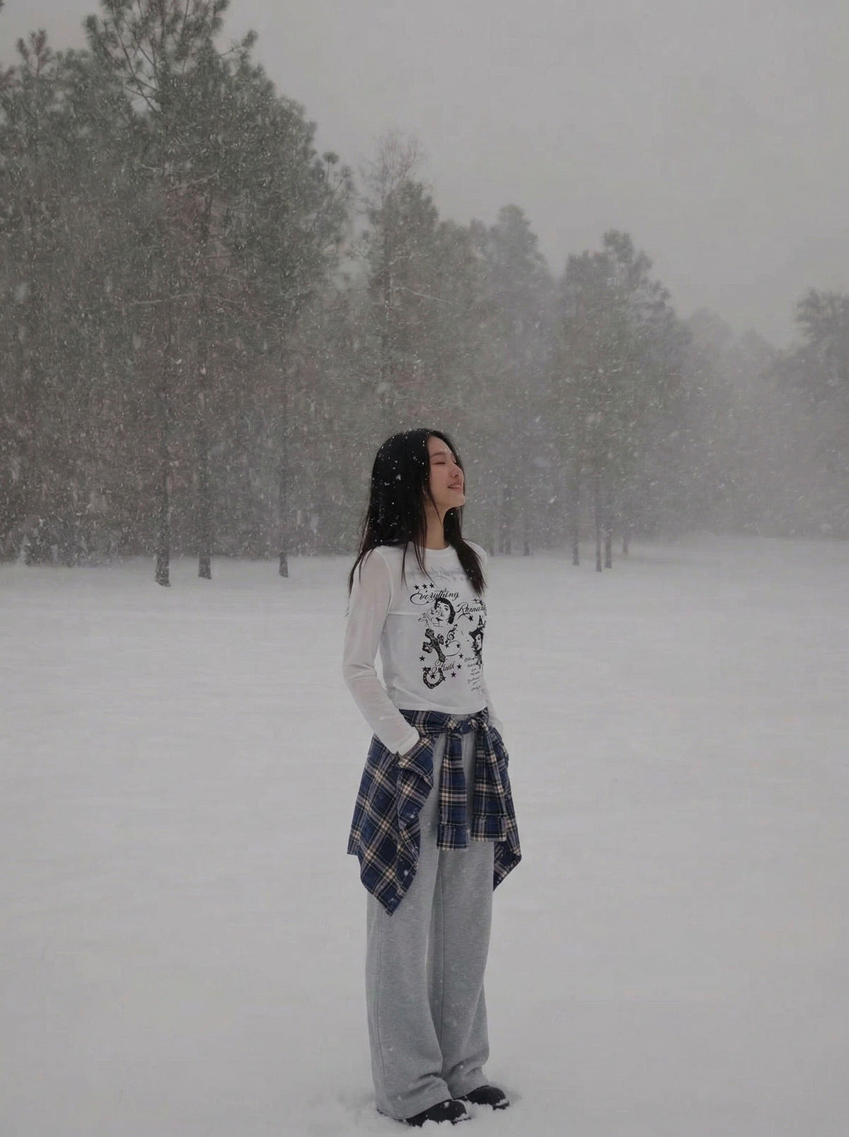 DAXUEN Graphic long sleeve t-shirt with text and designs — model photo