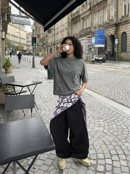 DAXUEN Relaxed-fit mock neck t-shirt with textured panel — model photo