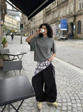 DAXUEN Relaxed-fit mock neck t-shirt with textured panel — model photo