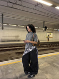 DAXUEN Relaxed-fit mock neck t-shirt with textured panel — model photo