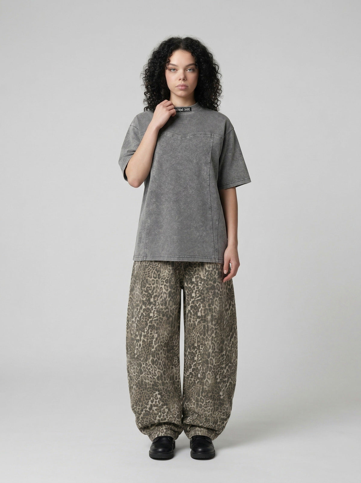 DAXUEN Relaxed-fit mock neck t-shirt with textured panel — model photo