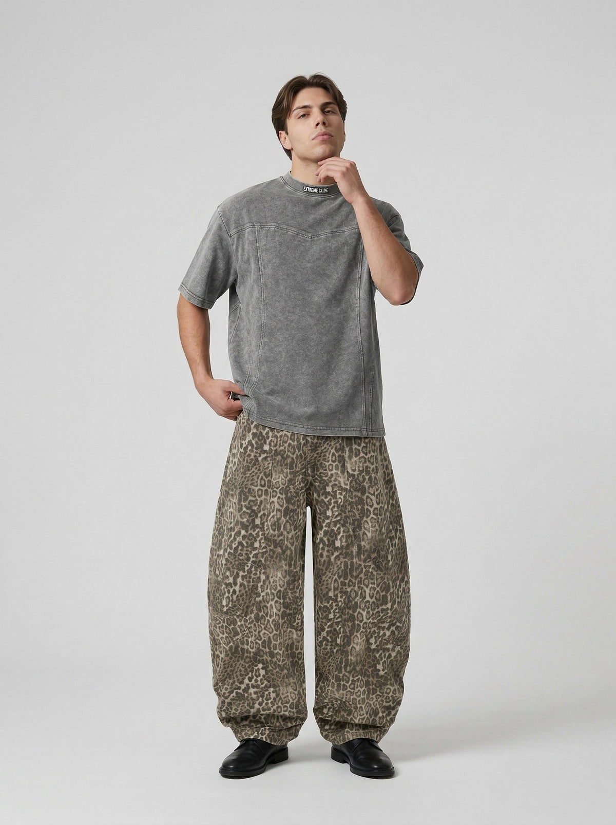 DAXUEN Relaxed-fit mock neck t-shirt with textured panel — model photo