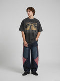 DAXUEN dark grey oversized eyes and crucifix graphic tee — model photo