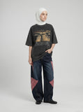 DAXUEN dark grey oversized eyes and crucifix graphic tee — model photo