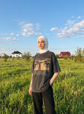 DAXUEN dark grey oversized eyes and crucifix graphic tee — model photo