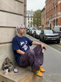 DAXUEN Oversized Playful Puppy Graphic Tee — model photo