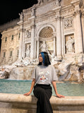 DAXUEN Oversized Playful Puppy Graphic Tee — model photo