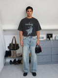 DAXUEN washed black oversized abstract graphic tee — model photo