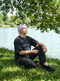 DAXUEN washed black oversized abstract graphic tee — model photo
