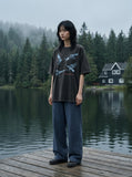 DAXUEN faded black eagle graphic t-shirt — model photo