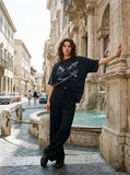 DAXUEN faded black eagle graphic t-shirt — model photo