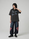 DAXUEN faded black eagle graphic t-shirt — model photo