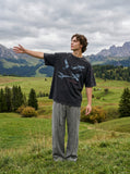DAXUEN faded black eagle graphic t-shirt — model photo