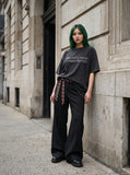 DAXUEN faded black text graphic oversized t-shirt — model photo