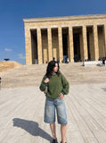 DAXUEN faded black wide-leg denim shorts — model photo