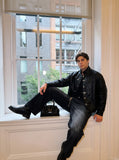 DAXUEN faded black wide-leg denim jeans with charm — model photo