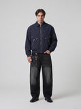 DAXUEN faded black wide-leg denim jeans with charm — model photo
