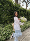 DAXUEN light blue faded bleached wide-leg jeans — model photo